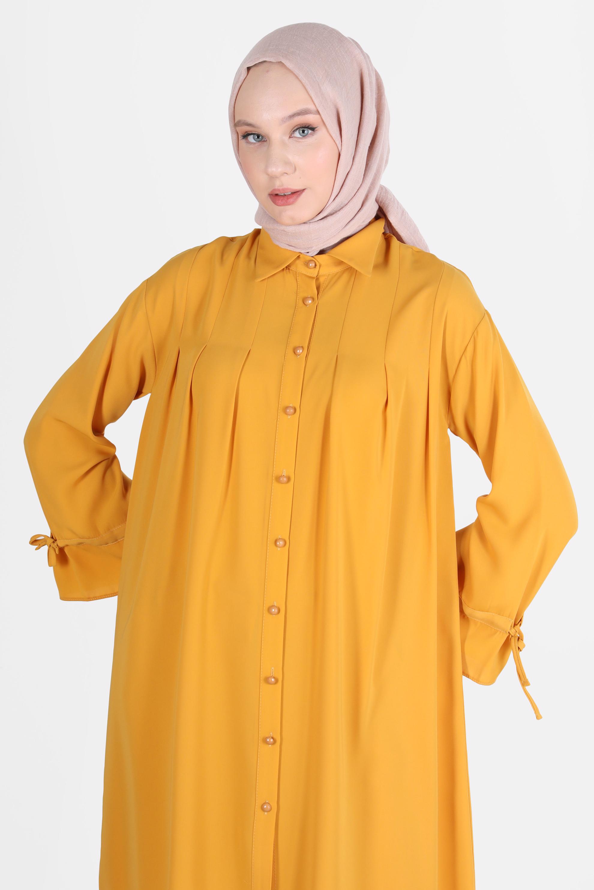 Tesettür giyim SARI PİLE DETAYLI İNCİ DÜĞMELİ TUNİK 42502 