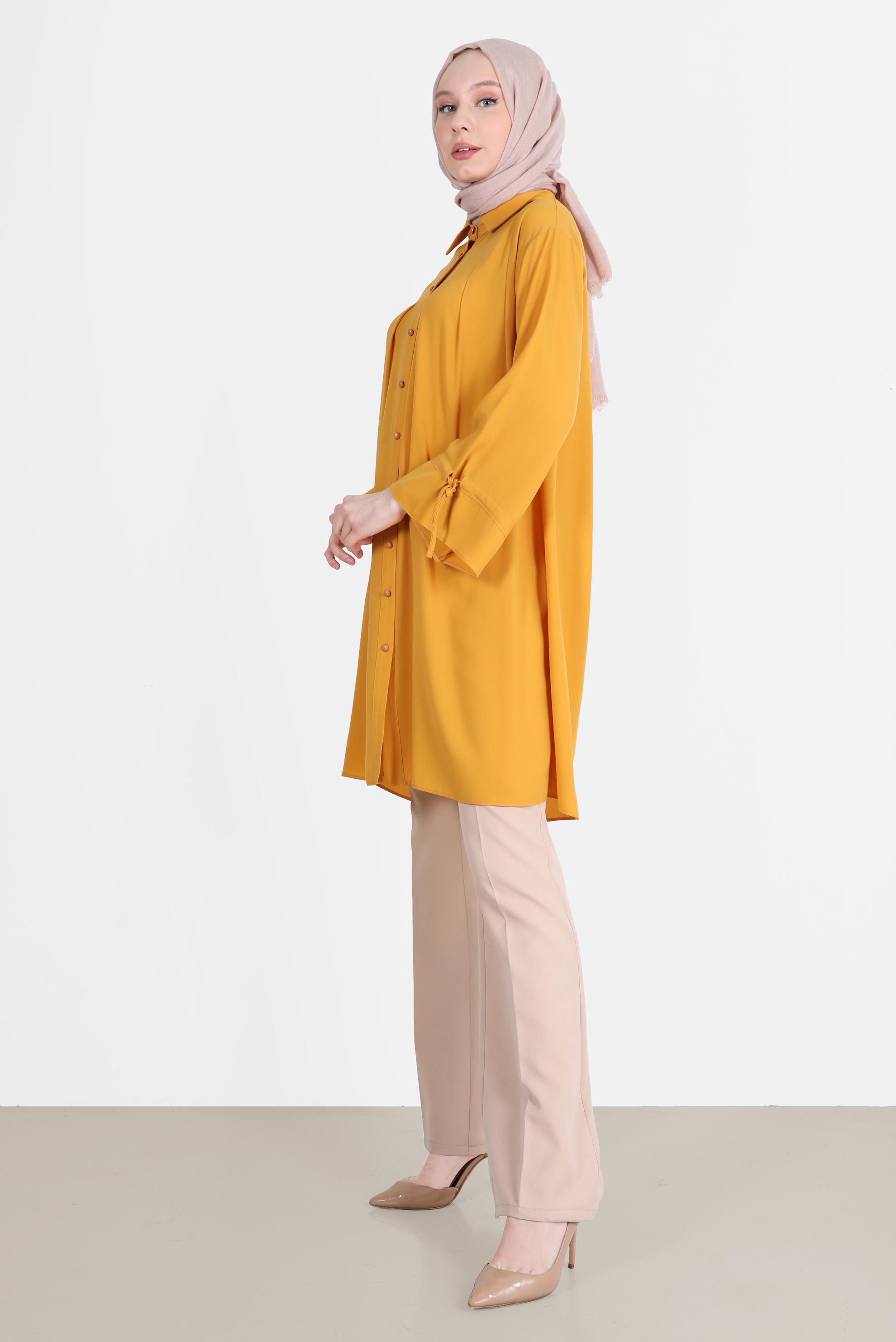 Tesettür giyim SARI PİLE DETAYLI İNCİ DÜĞMELİ TUNİK 42502 