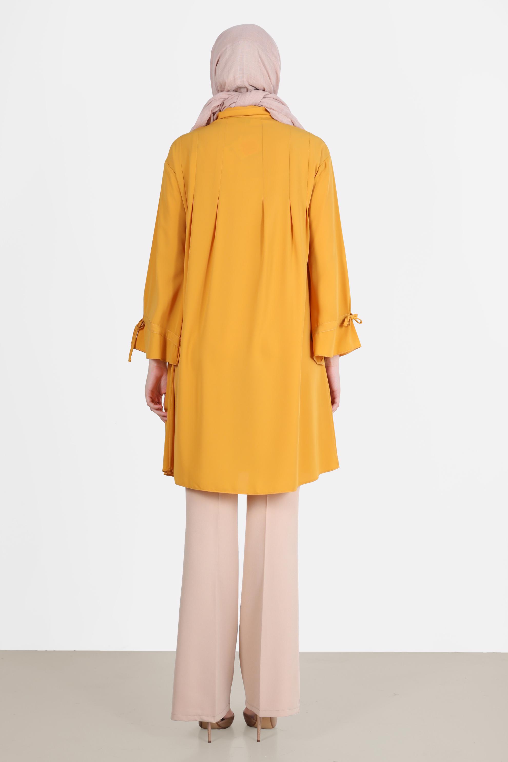 Tesettür giyim SARI PİLE DETAYLI İNCİ DÜĞMELİ TUNİK 42502 