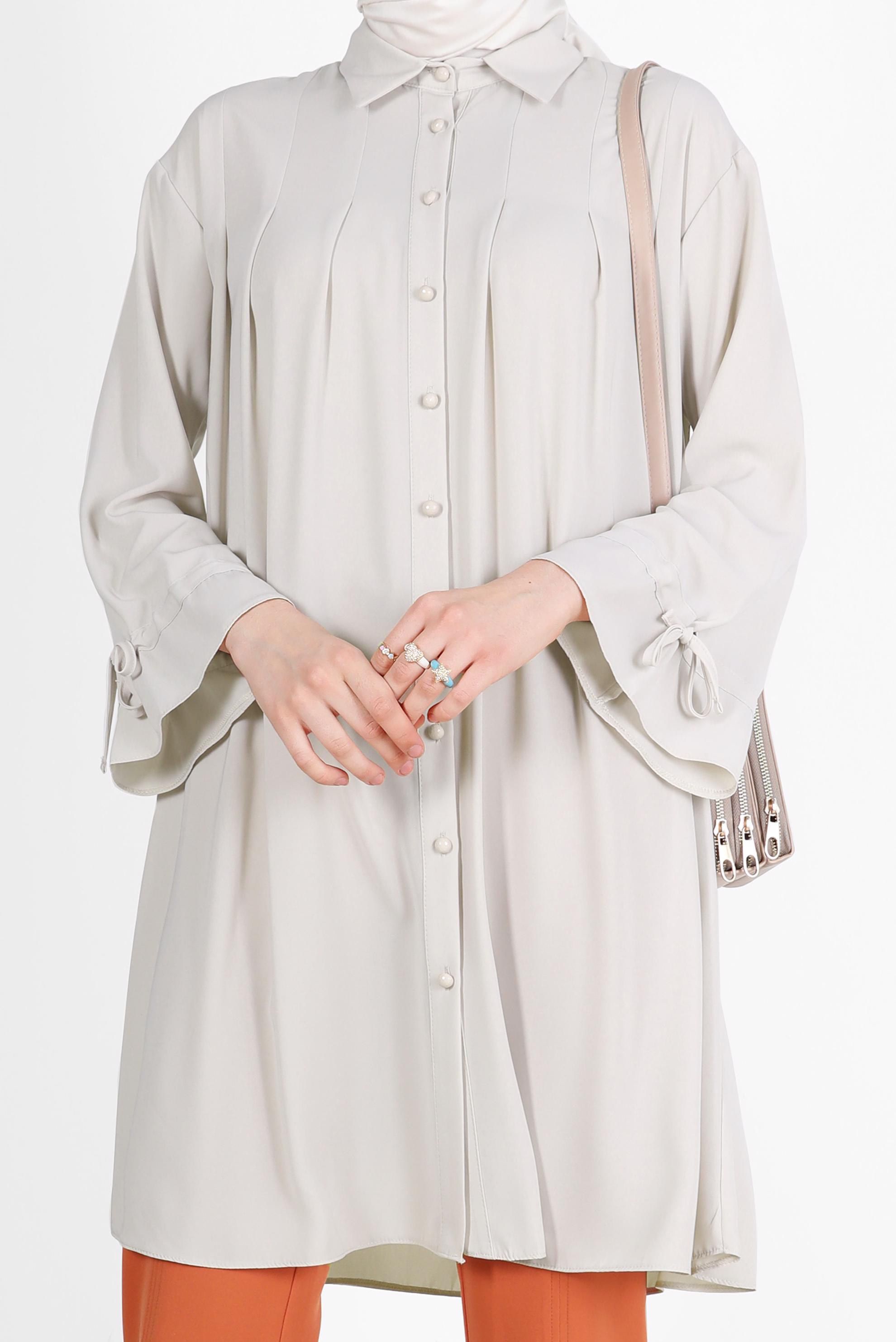 Tesettür giyim EKRU PİLE DETAYLI İNCİ DÜĞMELİ TUNİK 42502 