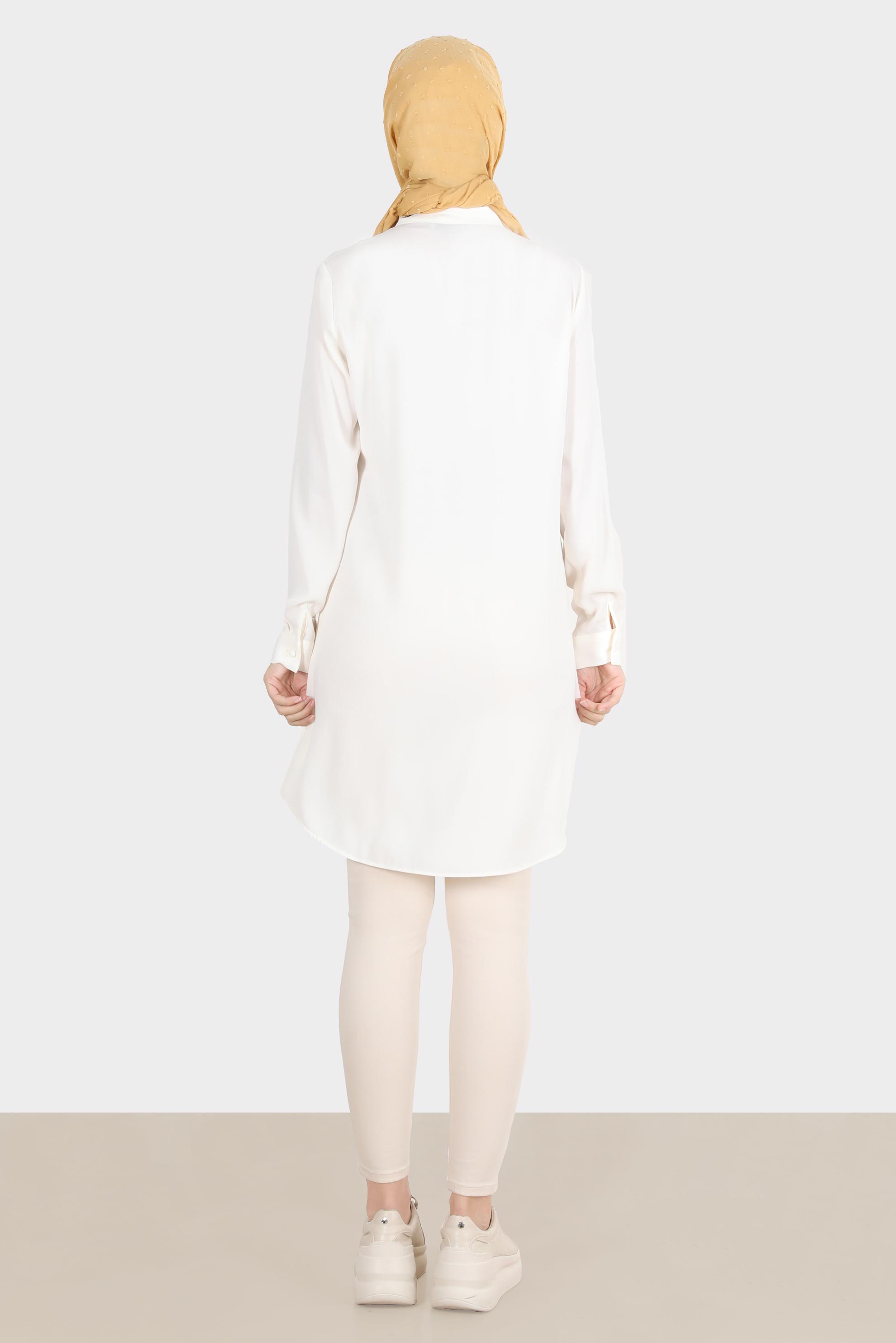 Tesettür giyim BEYAZ ÇİÇEK NAKIŞLI DÜĞMELİ AEROBİN TUNİK 42797 