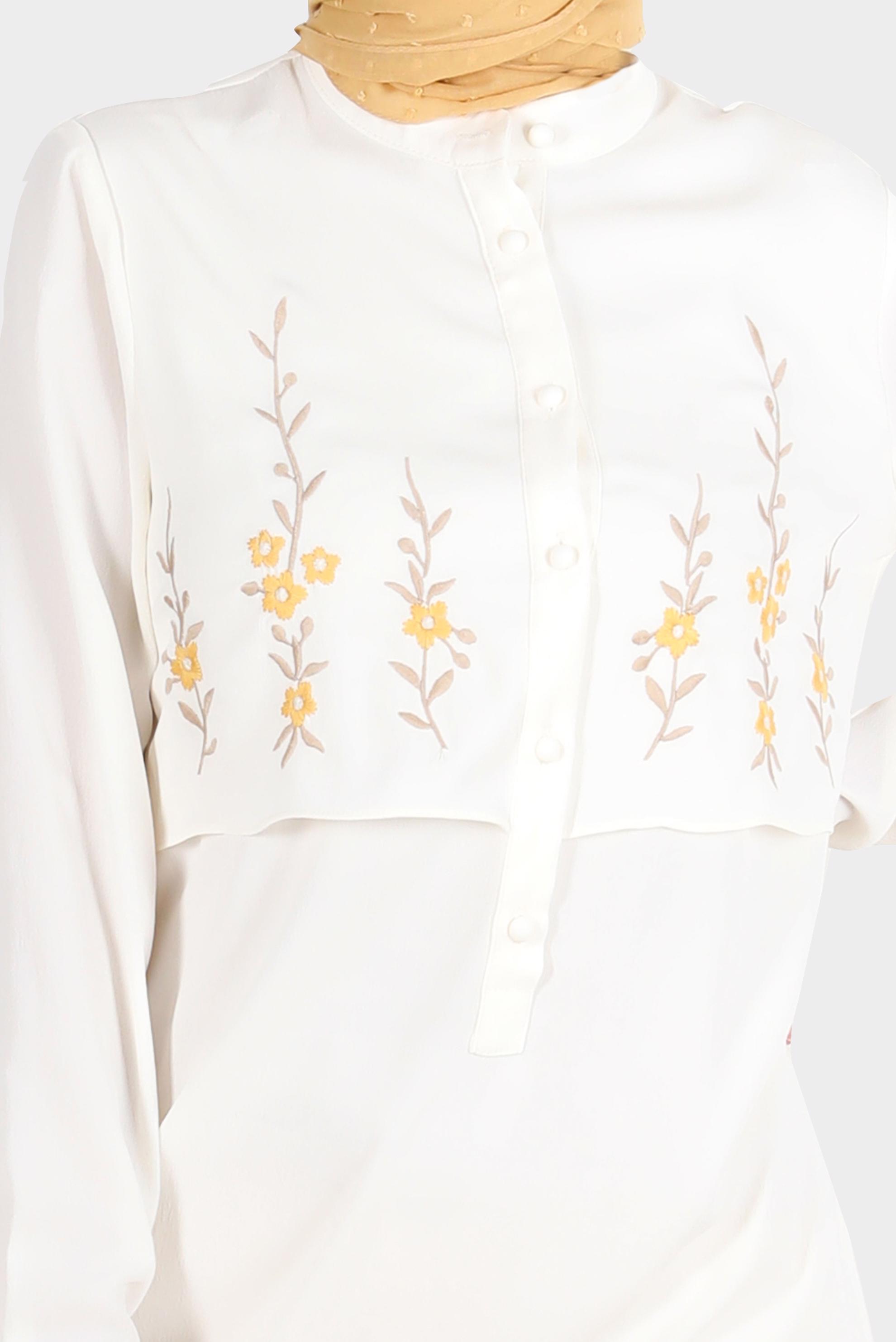 Tesettür giyim BEYAZ ÇİÇEK NAKIŞLI DÜĞMELİ AEROBİN TUNİK 42797 