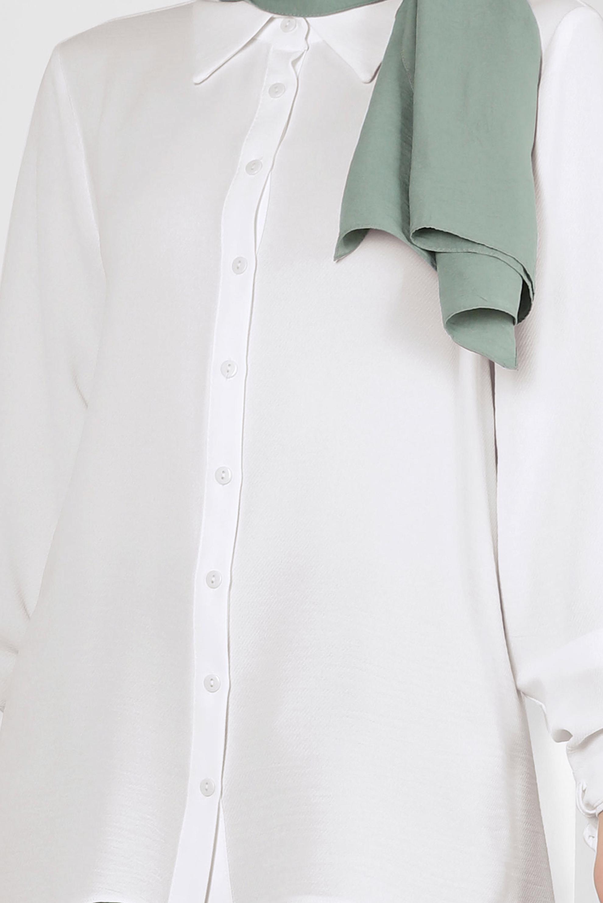 Tesettür giyim BEYAZ ASİMETRİK KESİM DÜĞMELİ BLUZ 43801