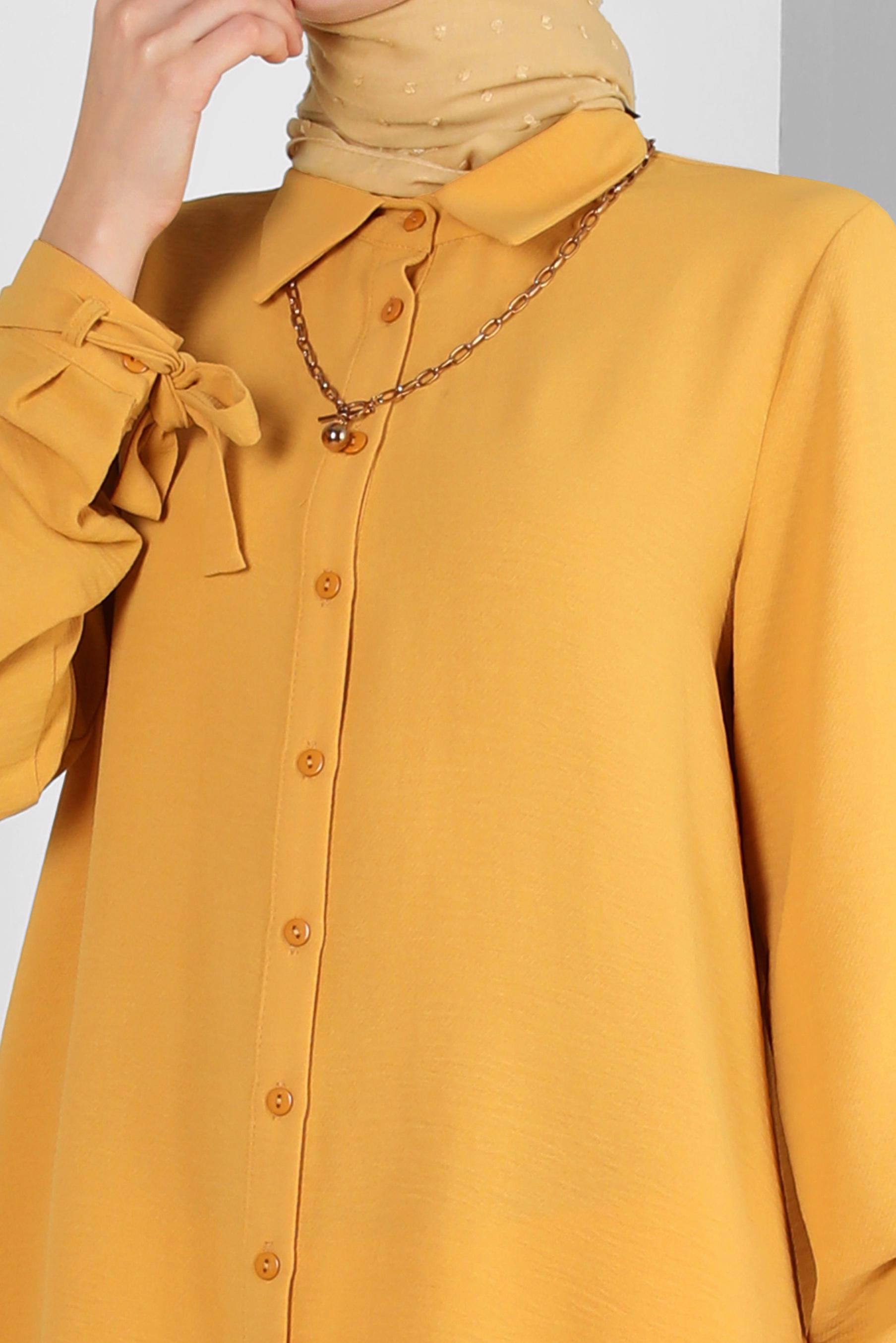 Tesettür giyim SARI ASİMETRİK KESİM DÜĞMELİ BLUZ 43801