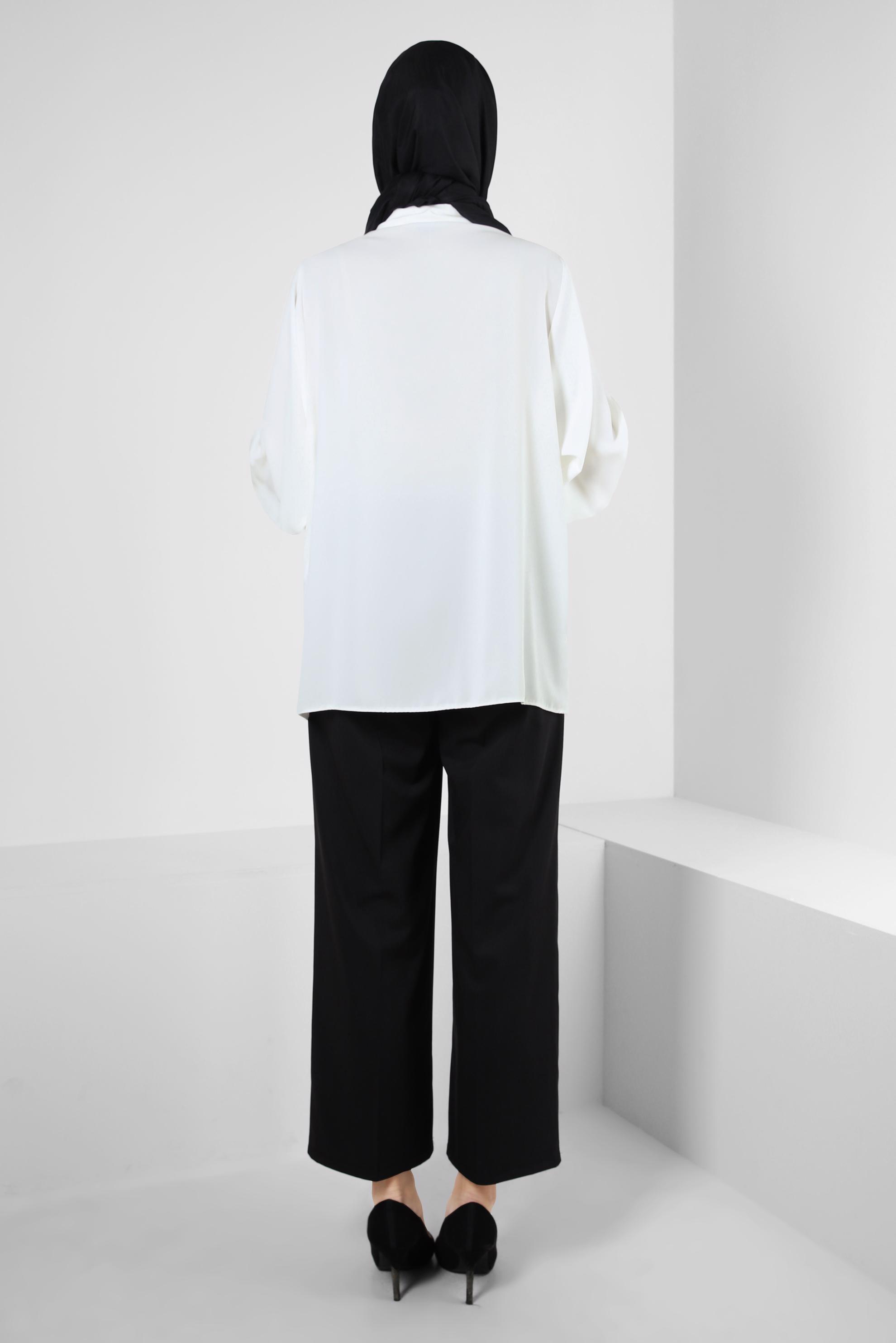 Tesettür giyim BEYAZ BALON KOL DÜĞMELİ BLUZ 43870