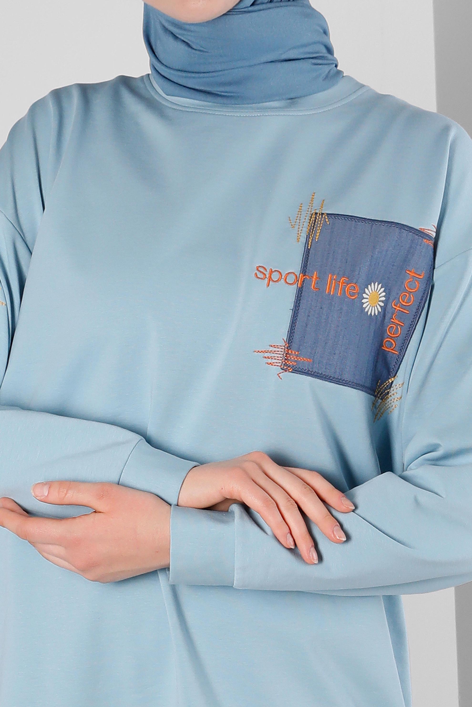 Tesettür giyim MAVİ BASKILI BÜZGÜ DETAYLI EŞOFMAN TUNİK 43557