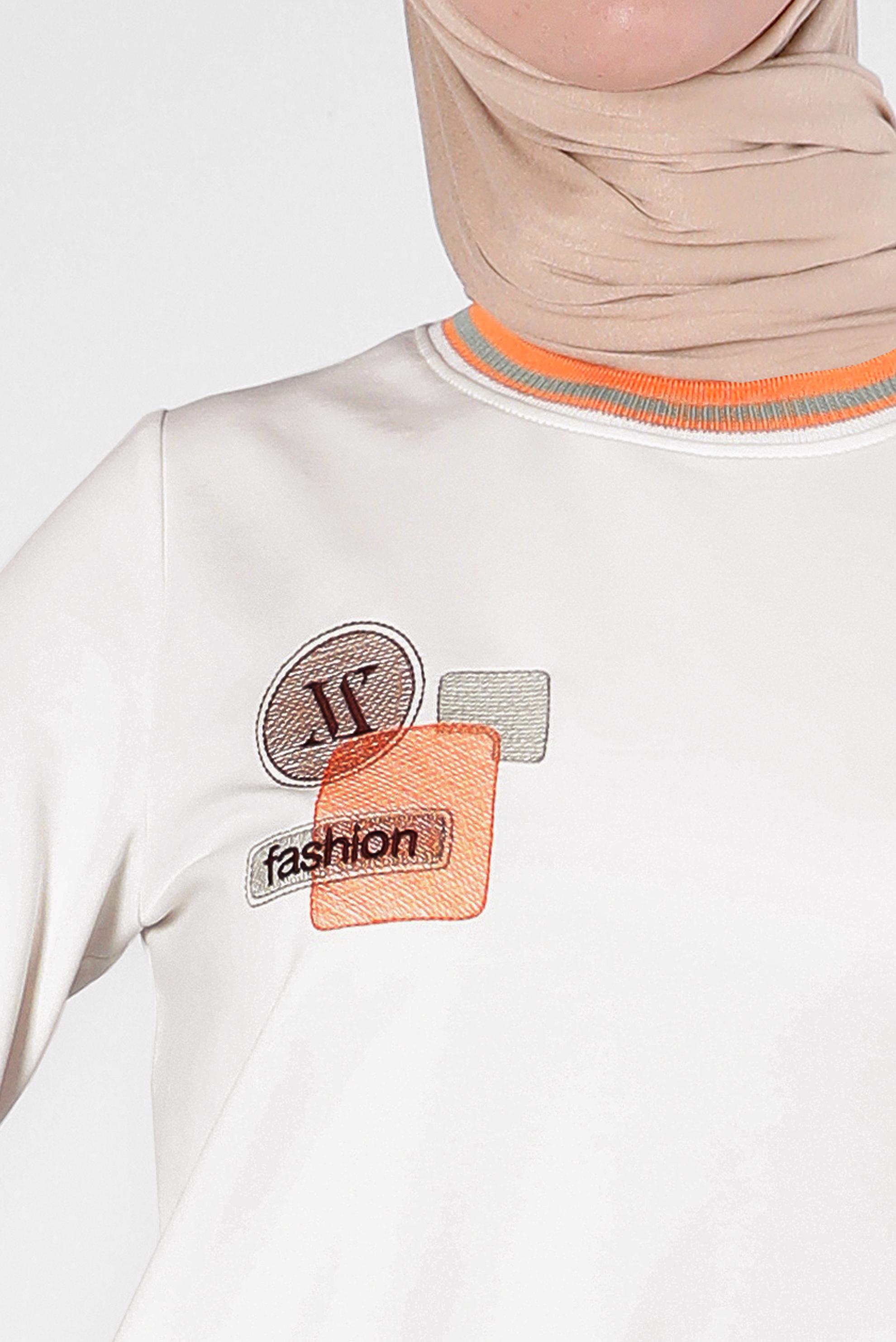 Tesettür giyim BEYAZ BASKILI ŞERİT DETAYLI EŞOFMAN TUNİK 43559