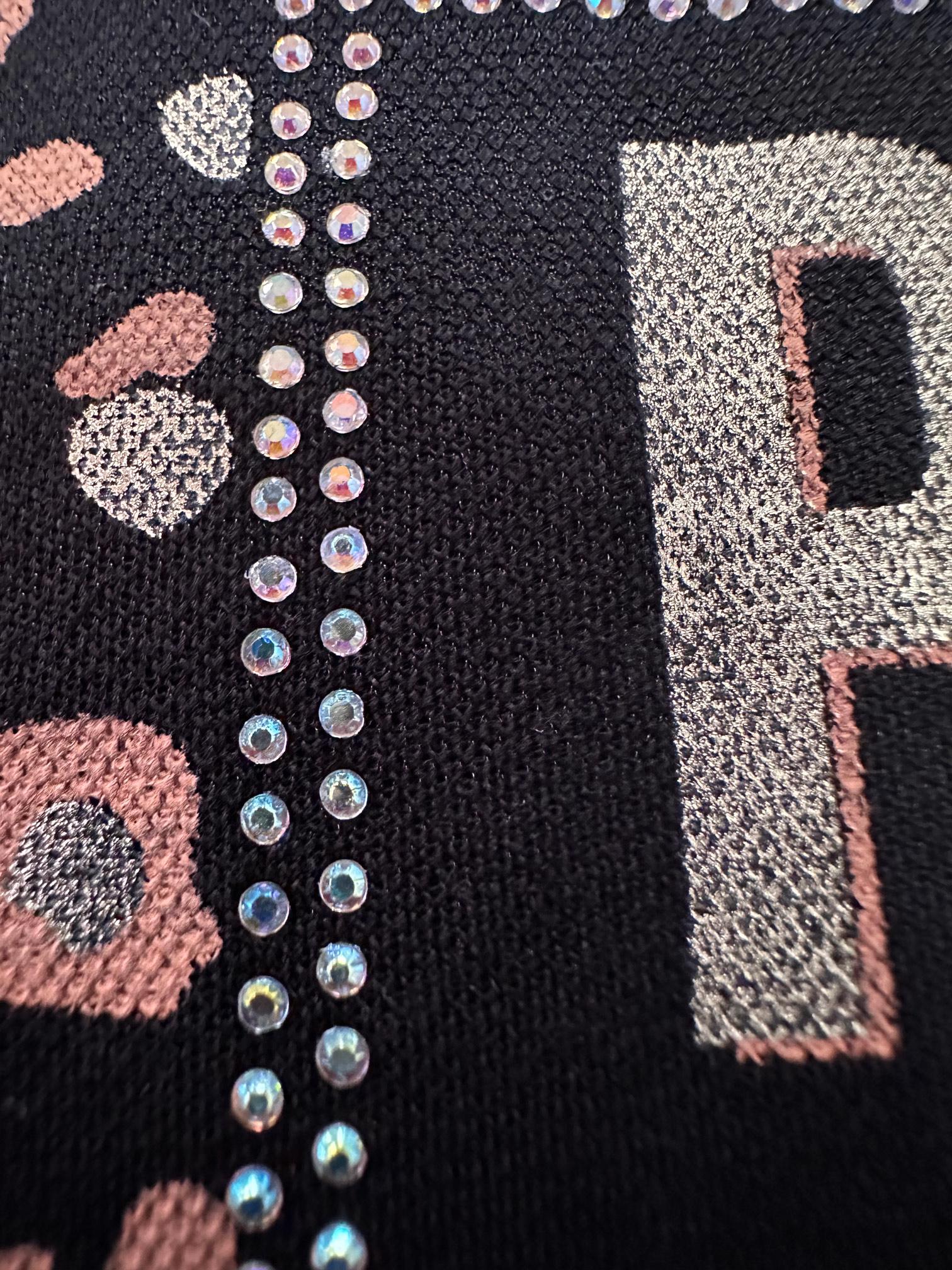 Tesettür giyim SİYAH LEOPAR DESENLİ YAZI BASKILI EŞOFMAN TUNİK 43700