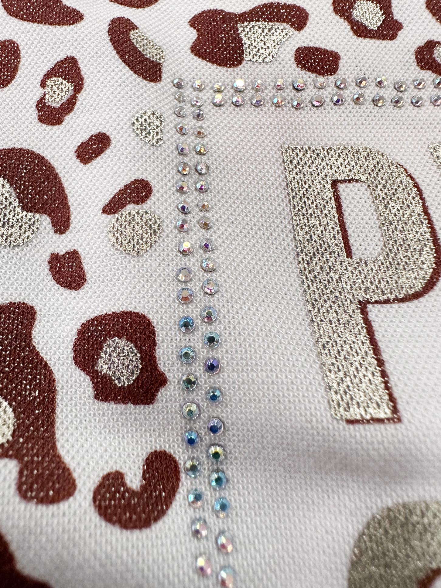 Tesettür giyim BEYAZ LEOPAR DESENLİ YAZI BASKILI EŞOFMAN TUNİK 43700