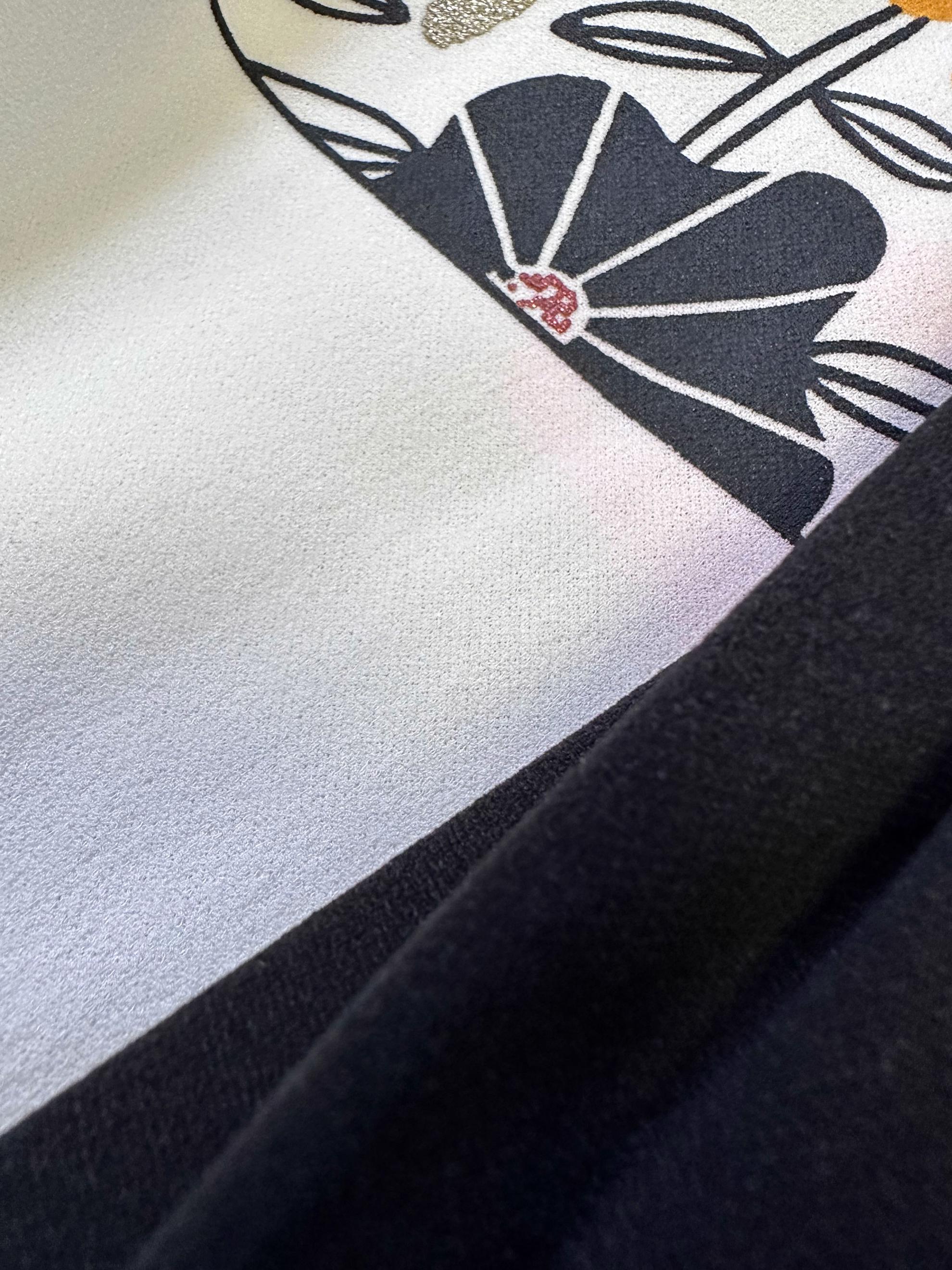 Tesettür giyim SİYAH BASKILI PİLİSELİ ETEKLİ EŞOFMAN TAKIM 43723