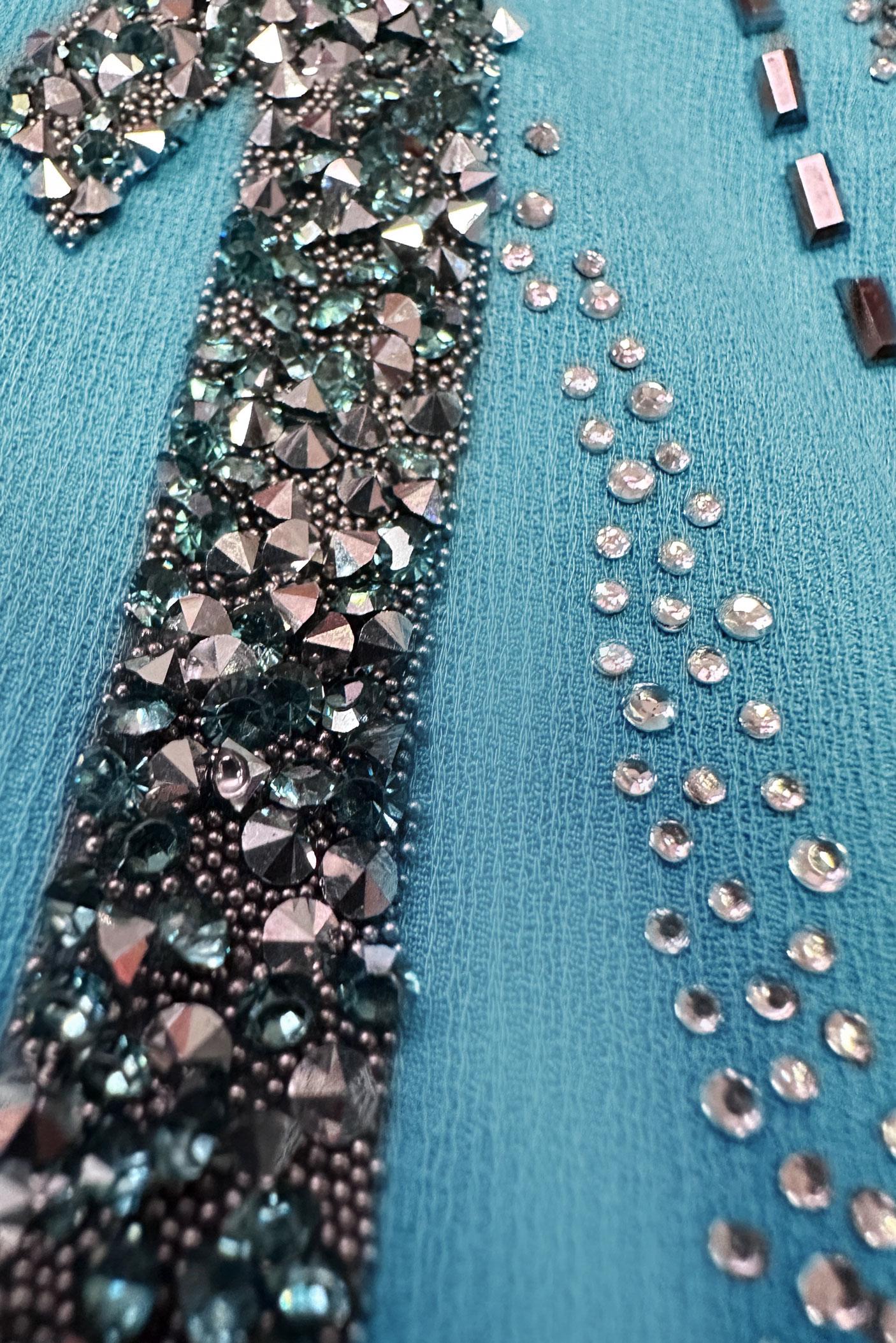 Tesettür giyim MAVİ GİZLİ DÜĞMELİ TAŞ BASKILI TUNİK 20386