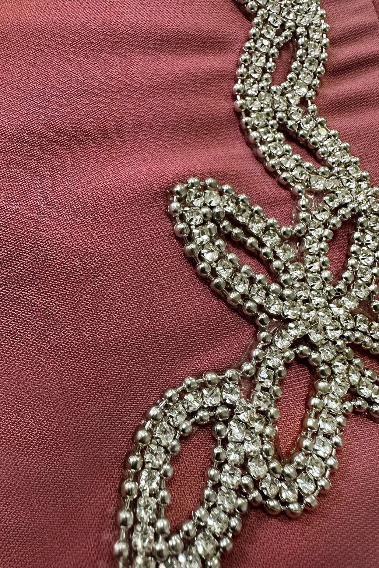 Tesettür giyim PEMBE İŞLEME DETAYLI GİZLİ DÜĞMELİ TUNİK 43500