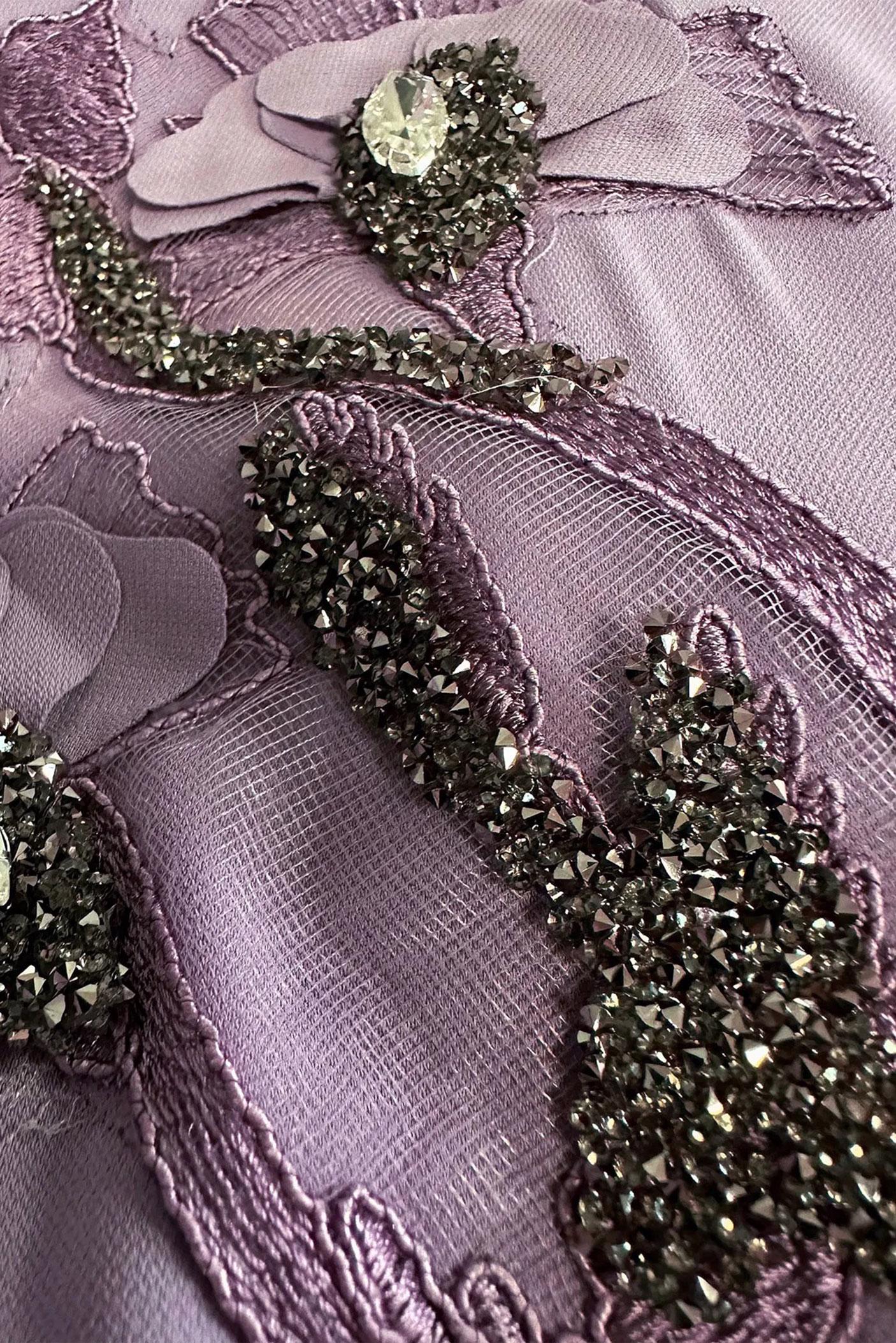 Tesettür giyim MOR TAŞ İŞLEMELİ MANŞETLERİ DÜĞMELİ TUNİK 43501