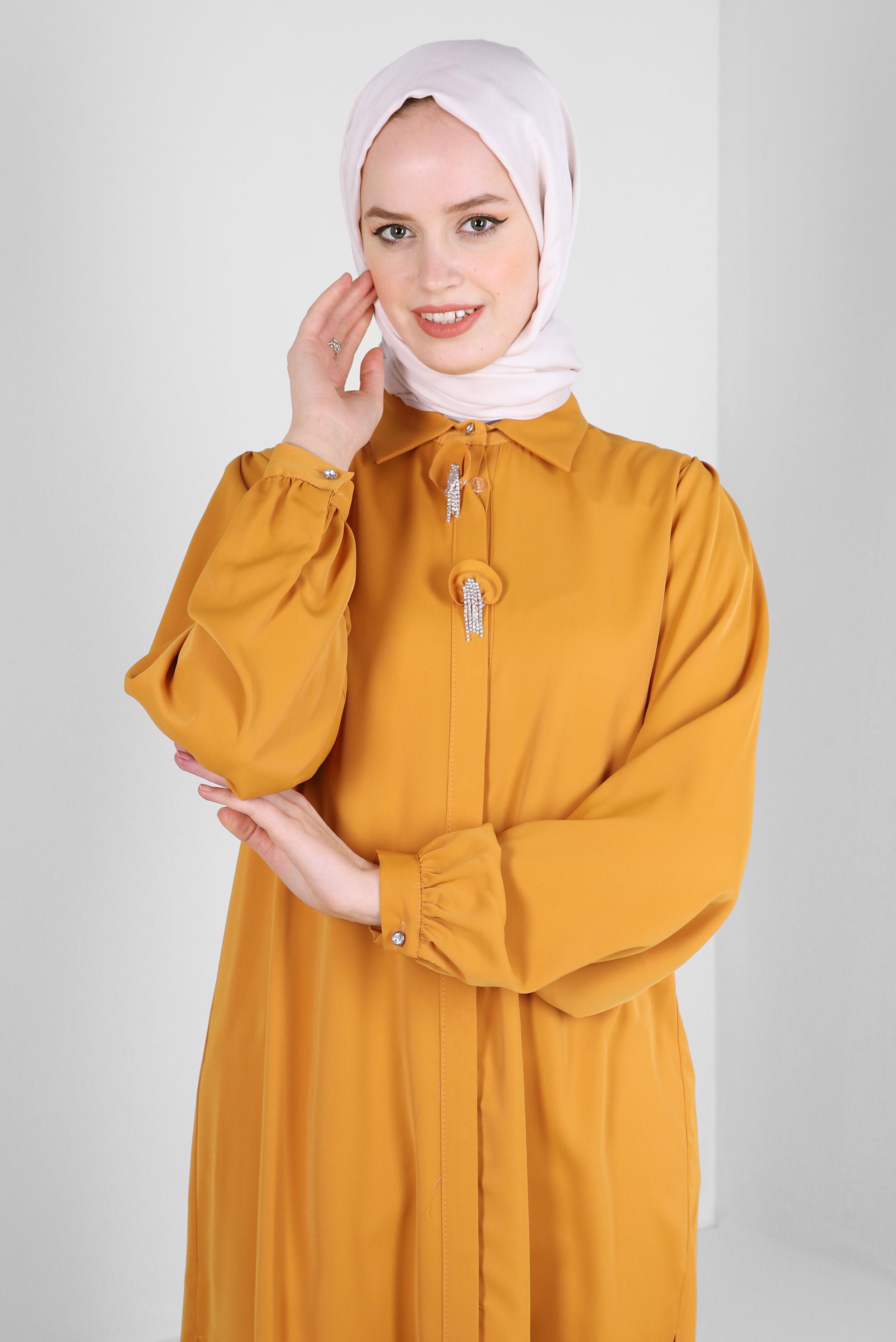 Tesettür giyim SARI TAŞ PÜSKÜL DETAYLI GİZLİ DÜĞMELİ TUNİK 43502