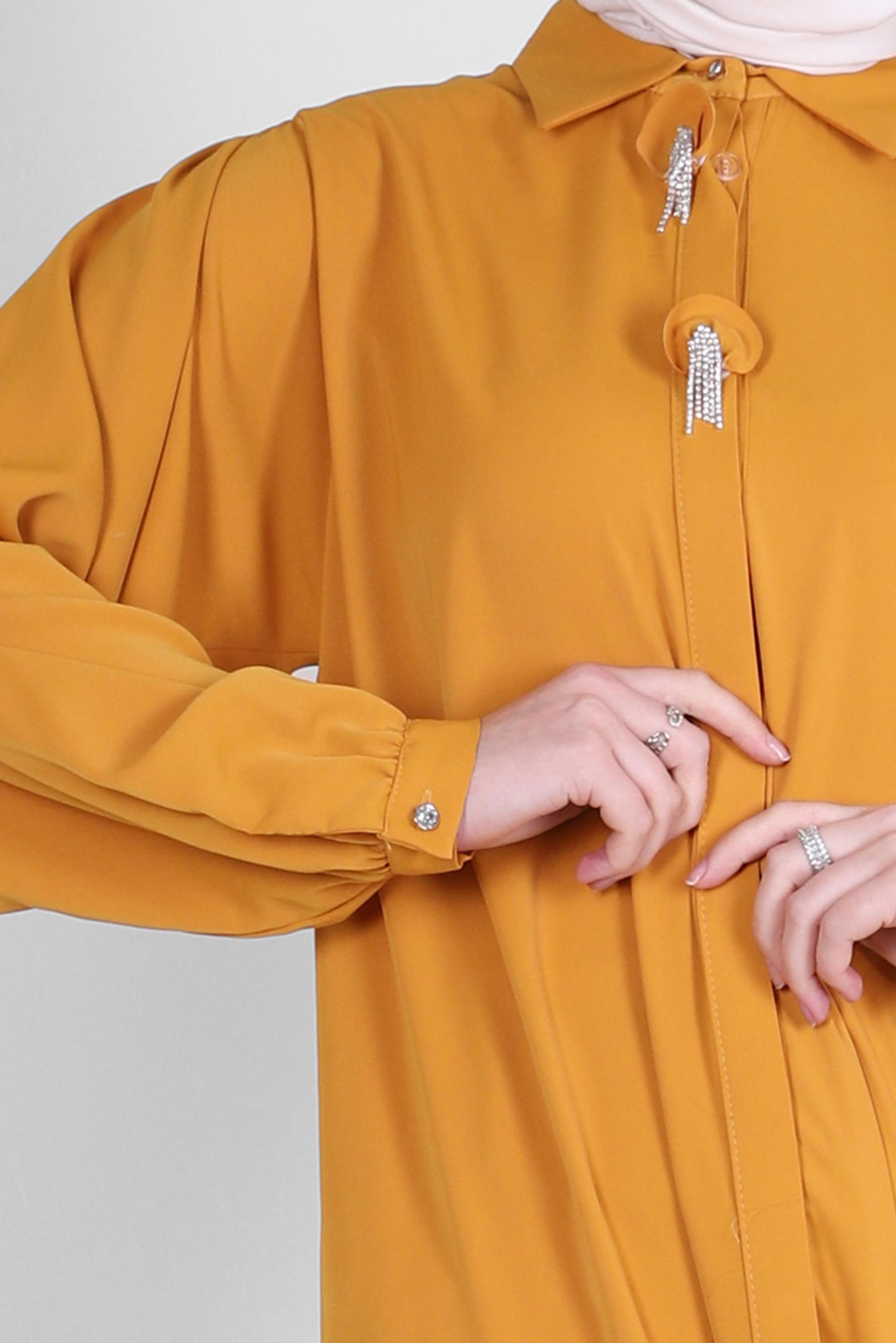 Tesettür giyim SARI TAŞ PÜSKÜL DETAYLI GİZLİ DÜĞMELİ TUNİK 43502