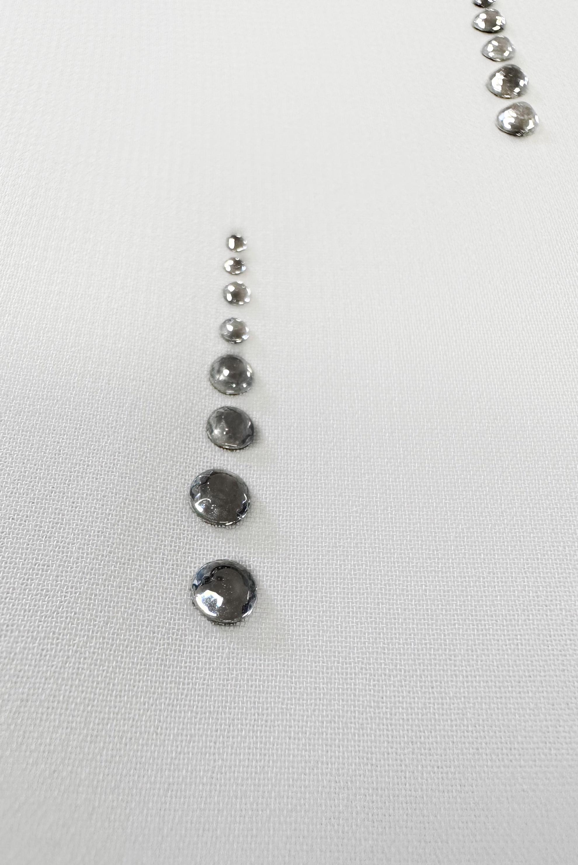 Tesettür giyim BEYAZ TAŞ BASKILI ASİMETRİK KESİM GÖMLEK TUNİK 43505