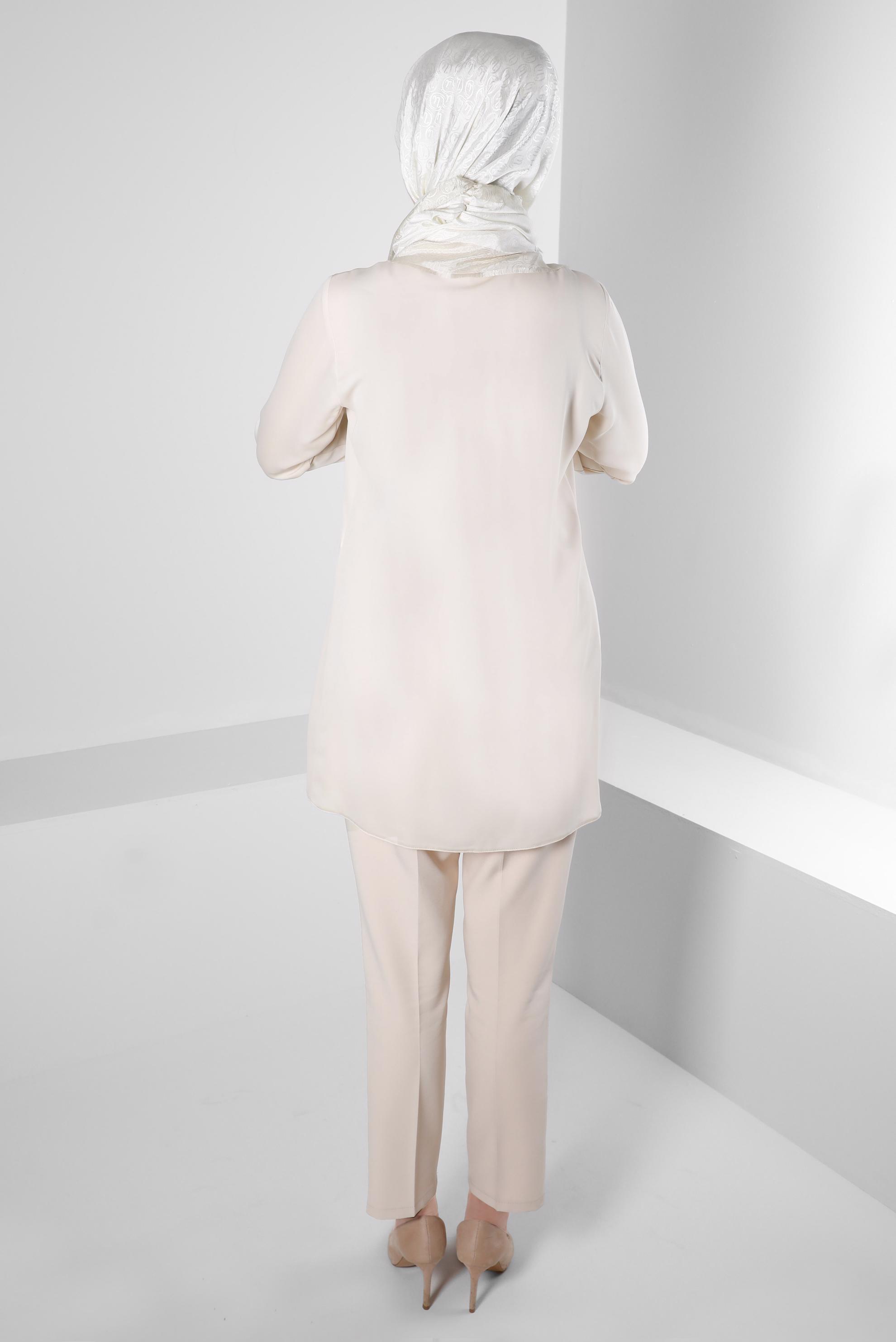 Tesettür giyim BEJ YAKASI İŞLEMELİ PİLİSE DETAYLI TUNİK 43509