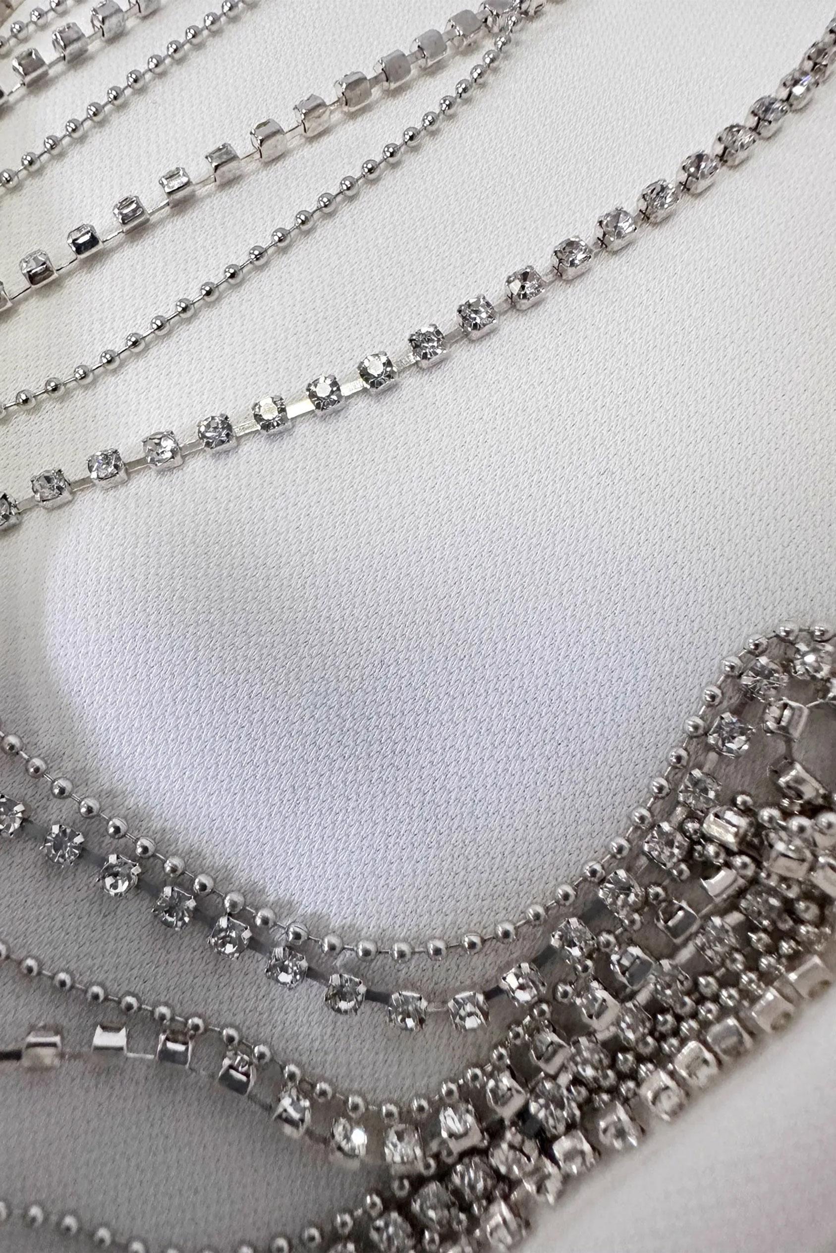 Tesettür giyim BEYAZ TAŞ PÜSKÜL DETAYLI YANI YIRTMAÇLI TUNİK 43545