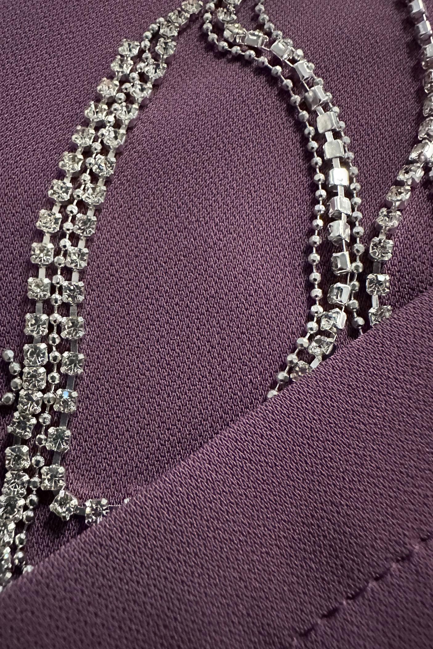 Tesettür giyim MOR TAŞ PÜSKÜL DETAYLI YANI YIRTMAÇLI TUNİK 43545