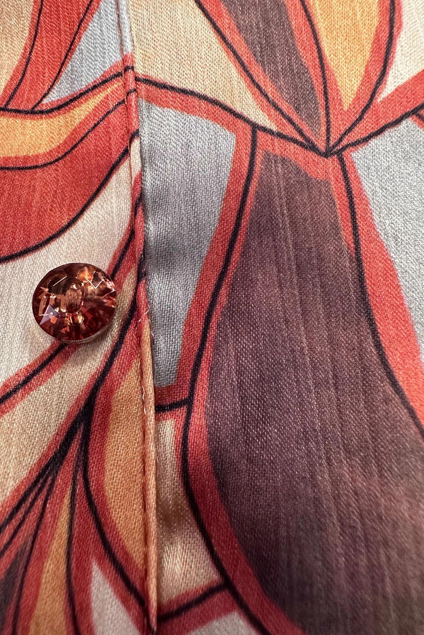 Tesettür giyim TURUNCU YAKASI BAĞLAMA DETAYLI DESENLİ TUNİK 43640