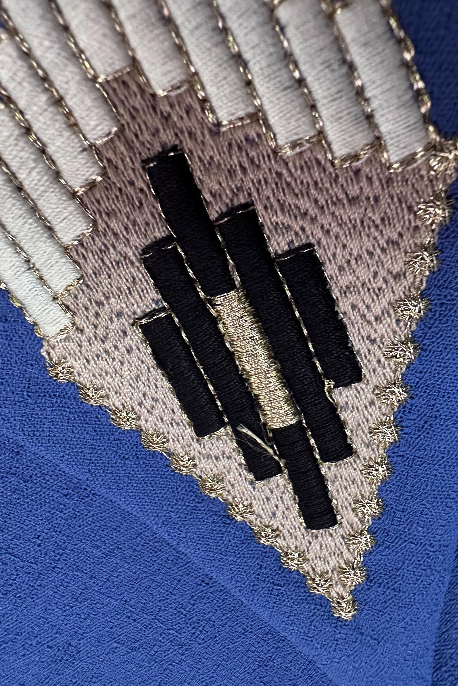 Tesettür giyim MAVİ NAKIŞ DETAYLI DÜĞMELİ TUNİK 43792