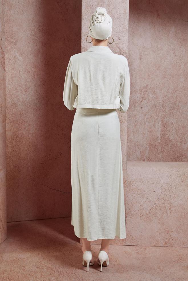 Tesettür giyim BEJ BÜZGÜ DETAYLI ETEKLİ TAKIM 44505 - ALVİNA