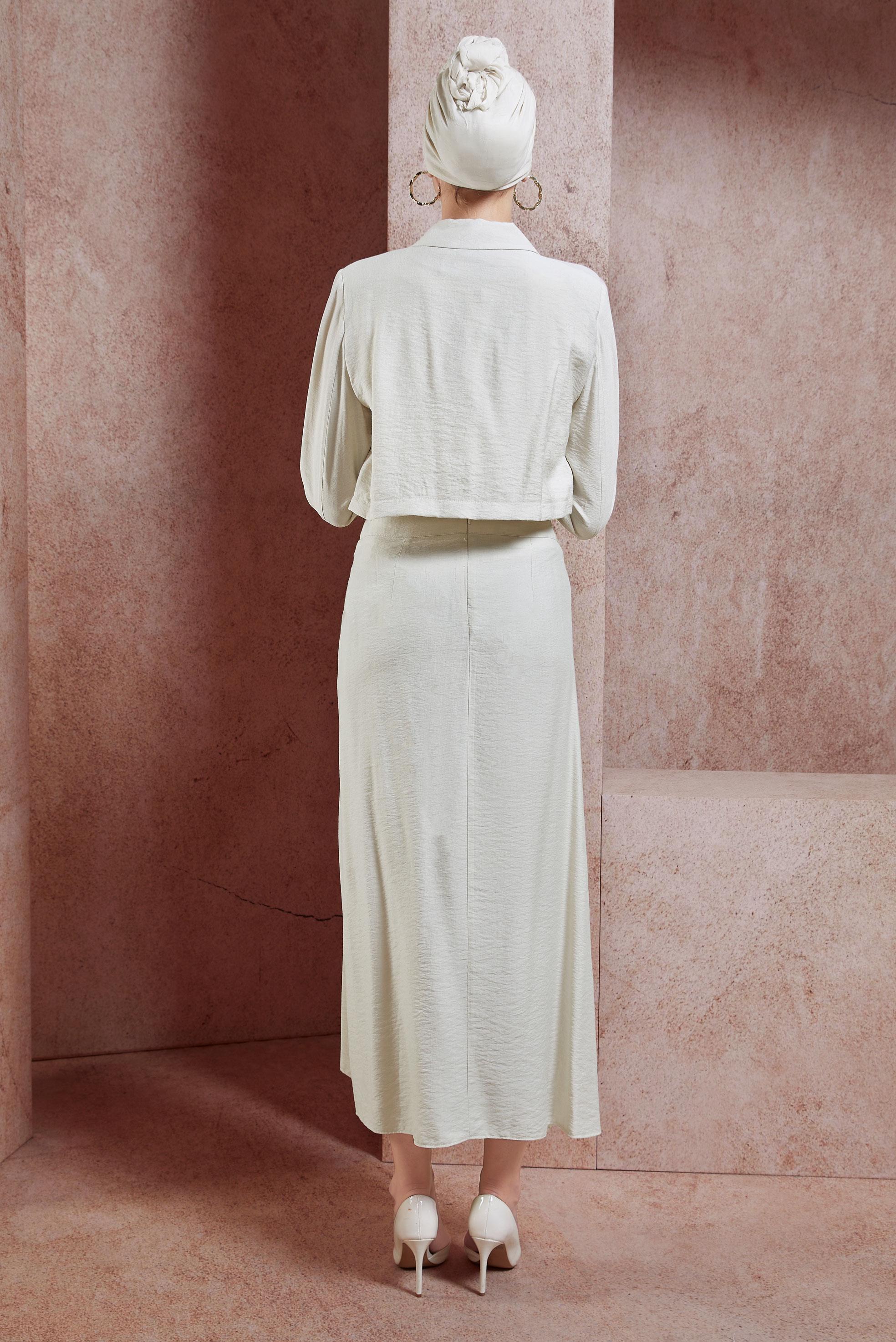 Tesettür giyim BEJ BÜZGÜ DETAYLI ETEKLİ TAKIM 44505