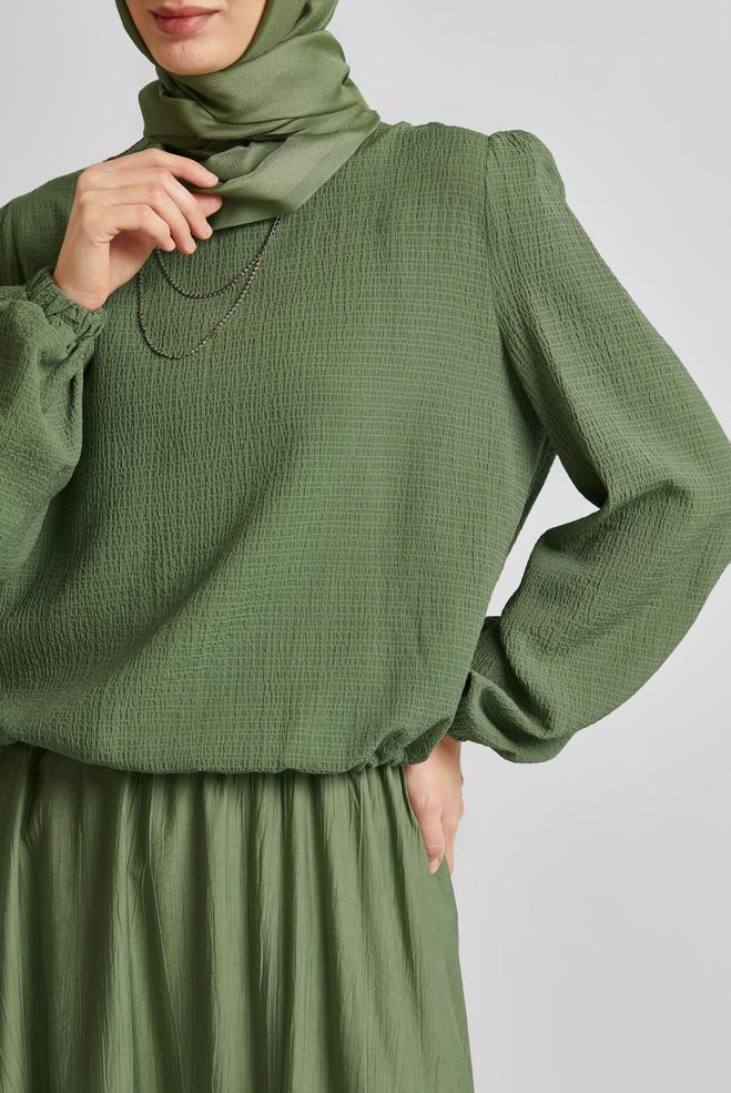 Tesettür giyim HAKİ BELİ BÜZGÜLÜ BLUZ 45656 - ALVİNA