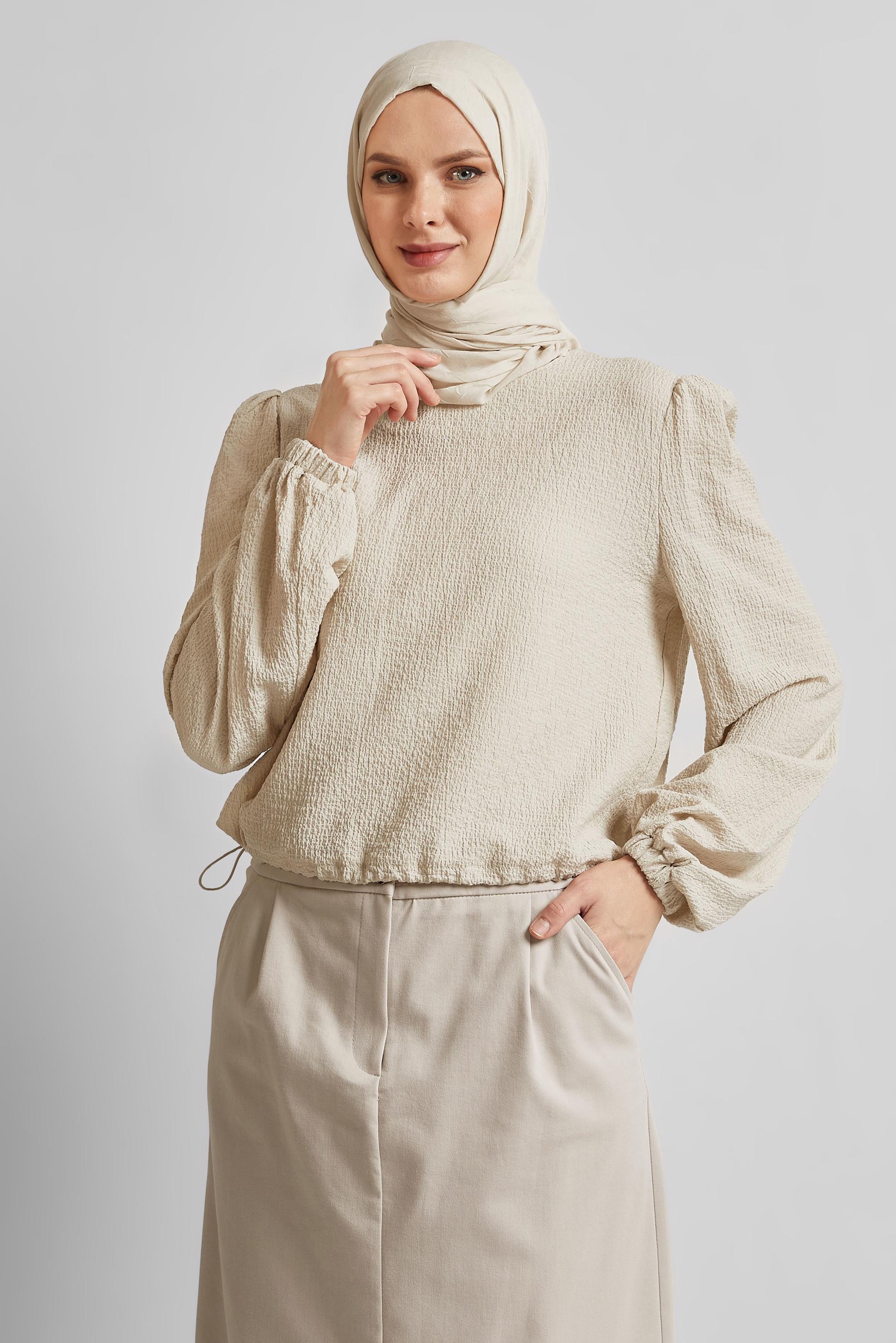 Tesettür giyim BEJ BELİ BÜZGÜLÜ BLUZ 45656