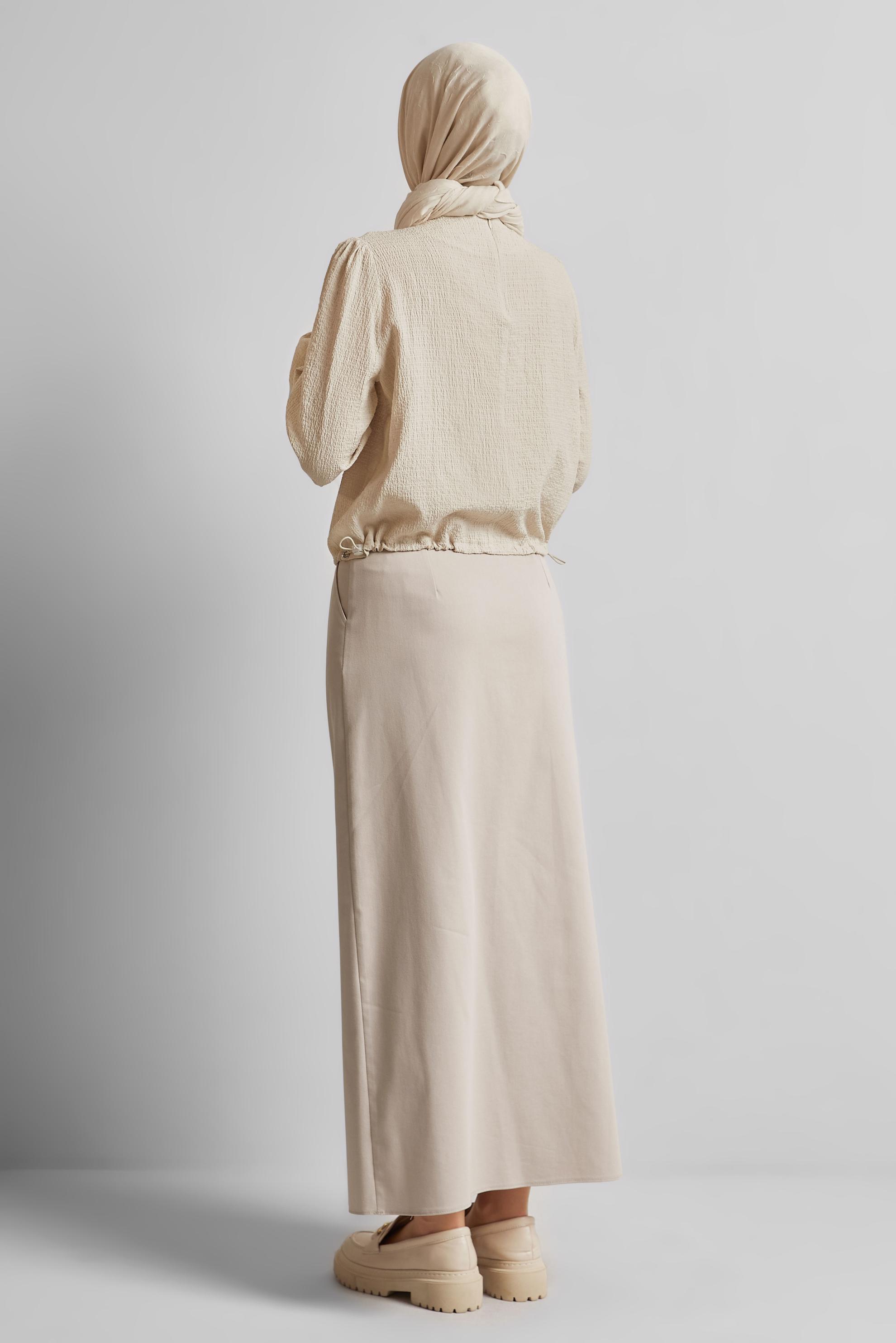 Tesettür giyim BEJ BELİ BÜZGÜLÜ BLUZ 45656