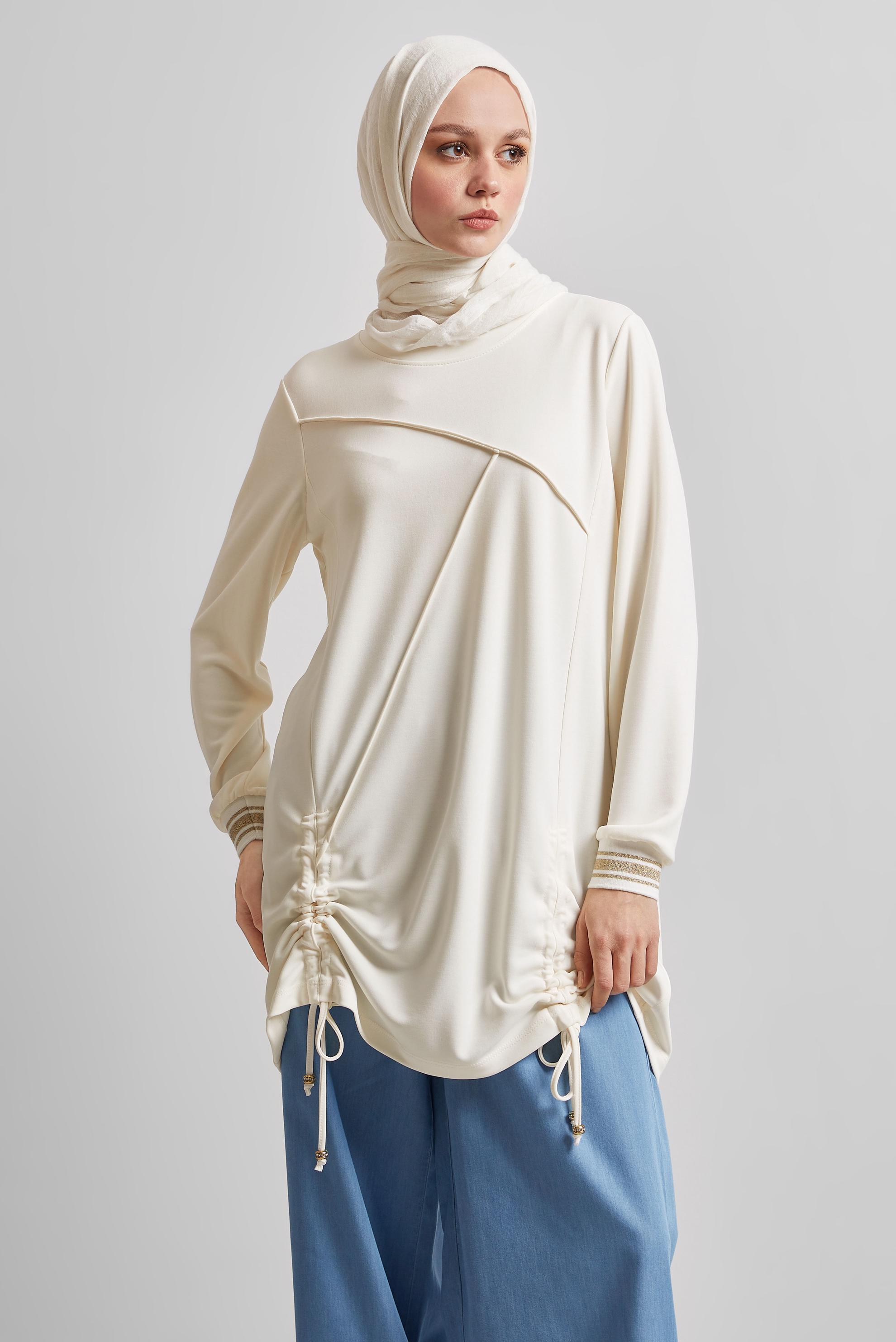 Tesettür giyim BEYAZ BÜZGÜ DETAYLI EŞOFMAN TUNİK 45462