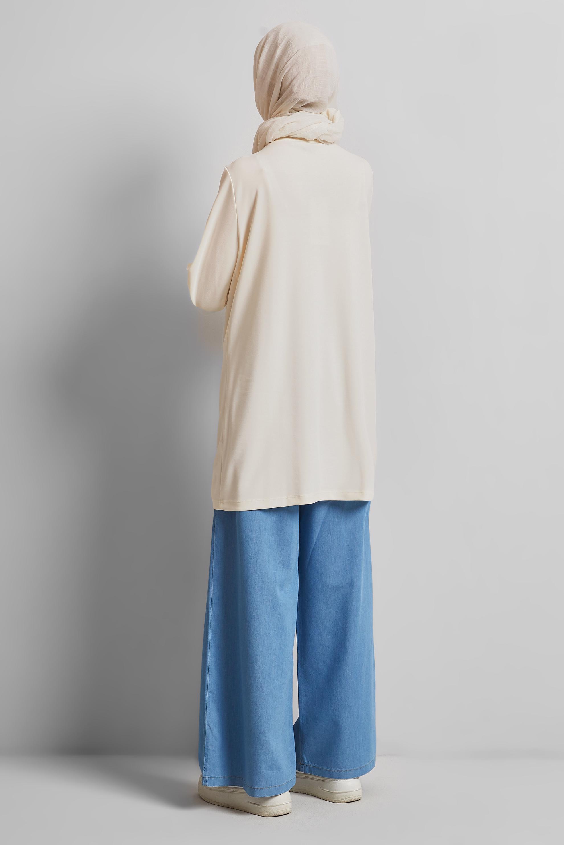 Tesettür giyim BEYAZ BÜZGÜ DETAYLI EŞOFMAN TUNİK 45462