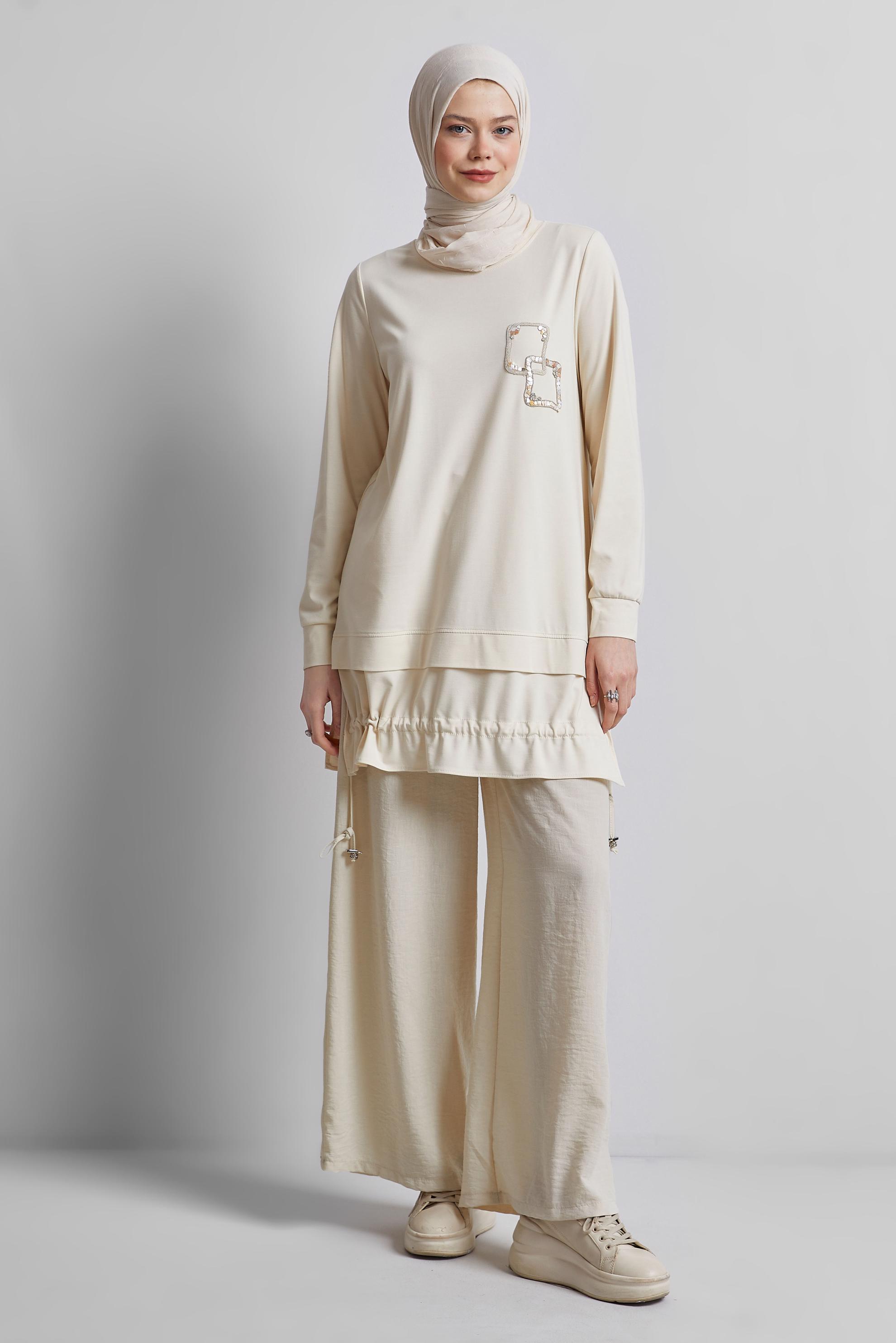 Tesettür giyim EKRU BÜZGÜ DETAYLI EŞOFMAN TUNİK 45463