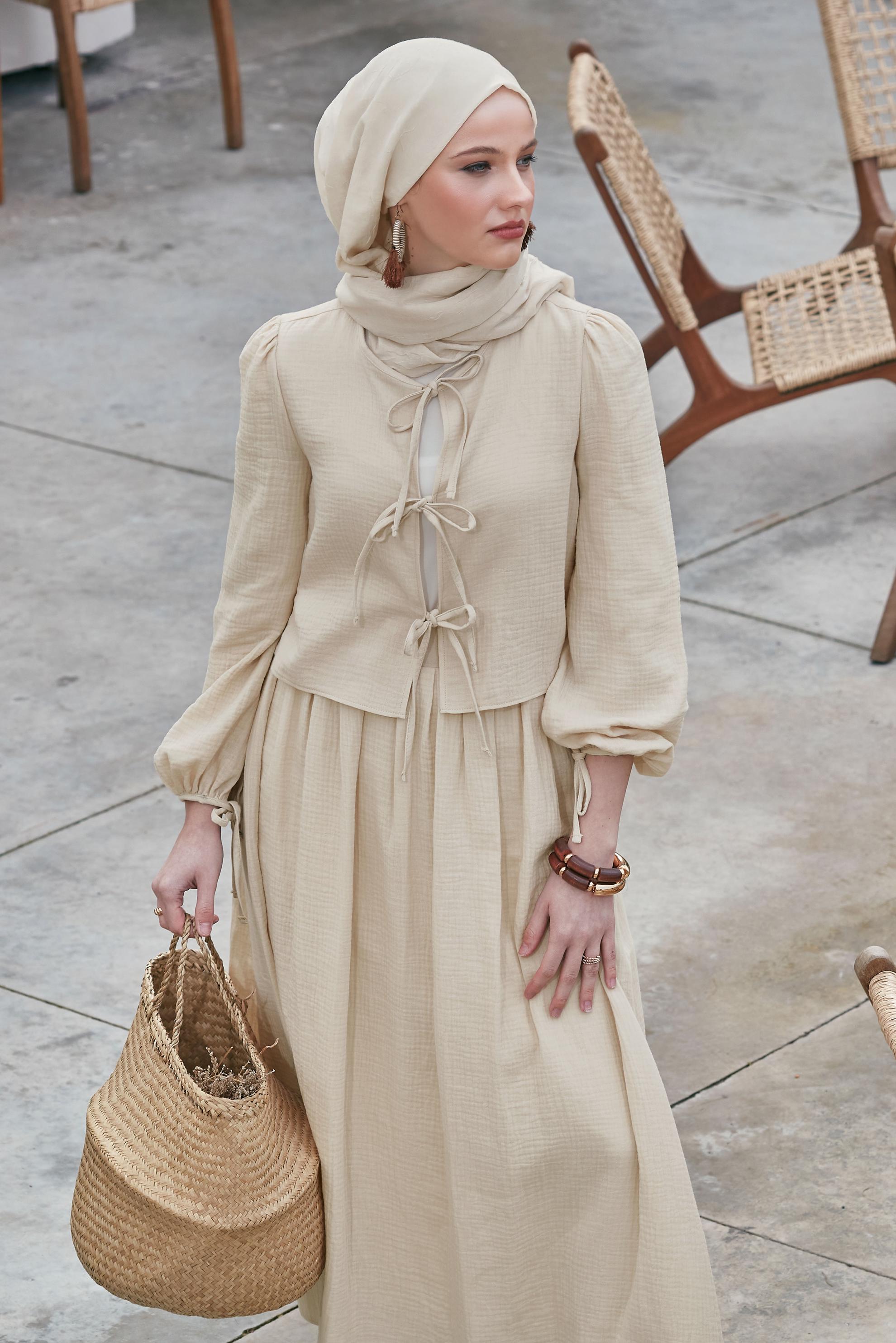 Tesettür giyim EKRU MÜSLİN ETEKLİ TAKIM 45342