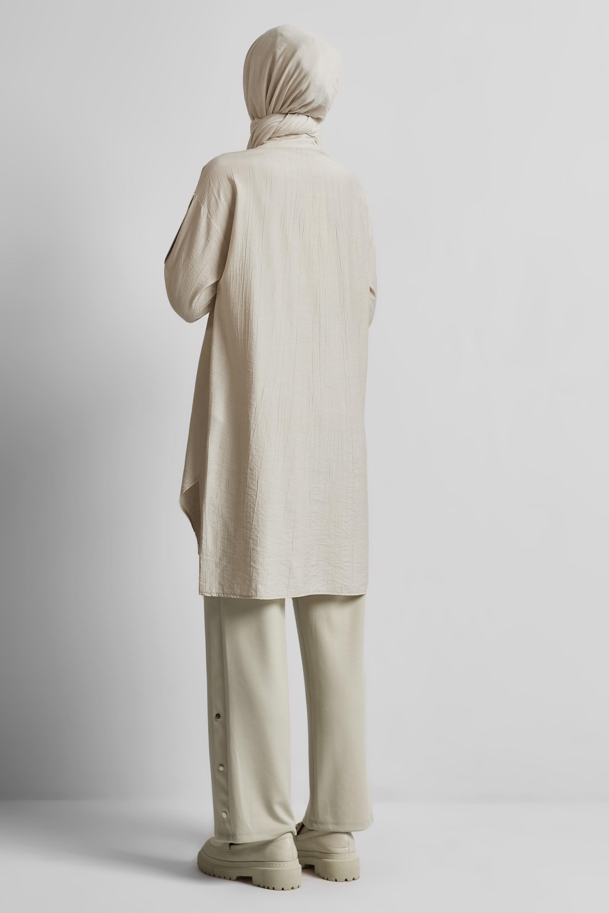 Tesettür giyim BEJ ÇITÇIT DETAYLI TUNİK 45681