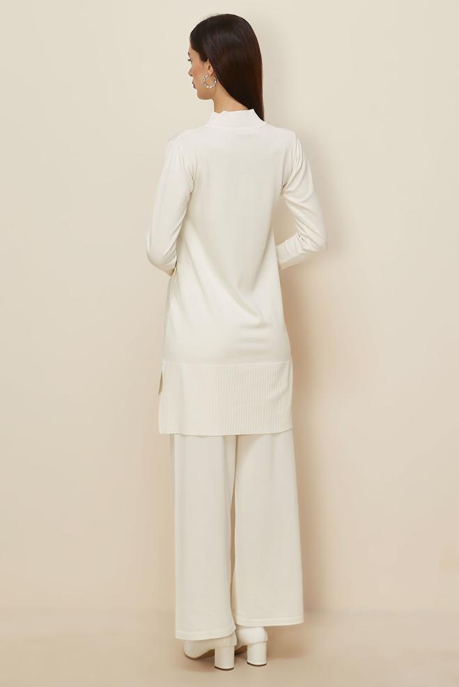 Tesettür giyim BEYAZ PANTOLONLU TAŞ BASKILI TRİKO TAKIM 45863 - ALVİNA
