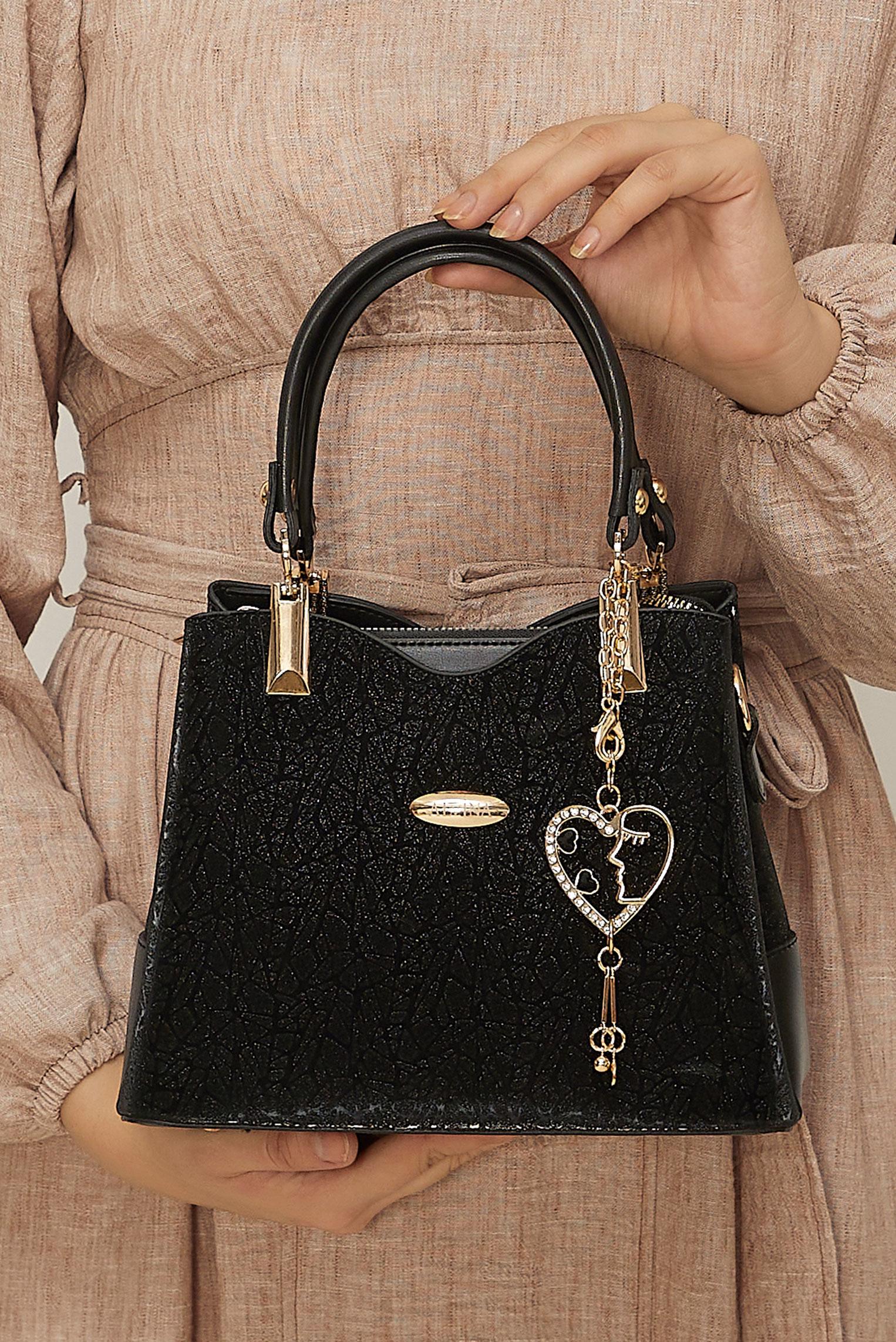 Tesettür giyim SİYAH ALVİNA AKSESUARLI PARLAK ÇANTA 2184-1