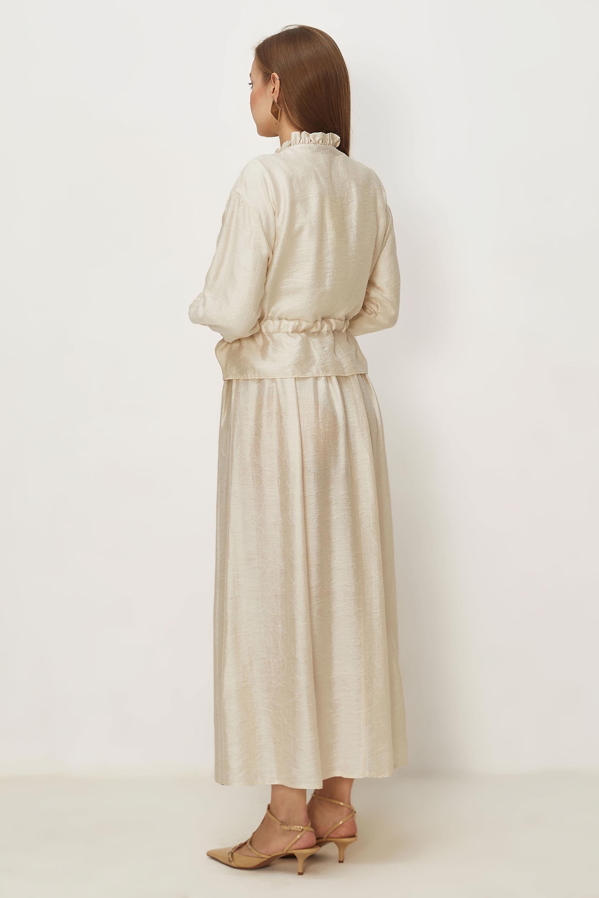 Tesettür giyim EKRU BAĞCIKLI ETEKLİ TAKIM 46601